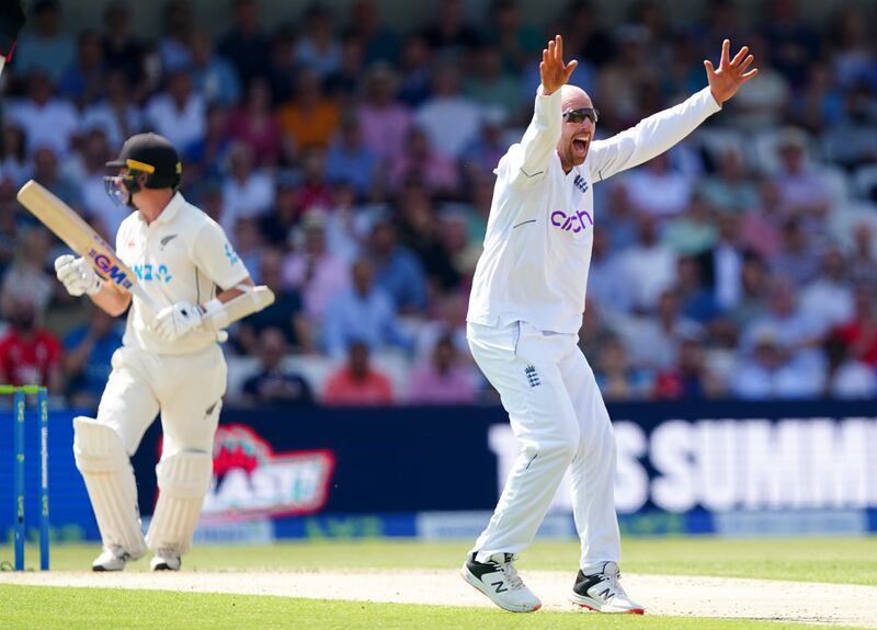 England spinner Jack Leach celebrates after taking the wicket of New Zealand's Will Young for 20. PA