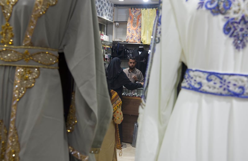 Abdullah Sayeed Omar Ba-abdulhadi, 41, runs a garment shop selling abayas and burqas for women in Barkas
