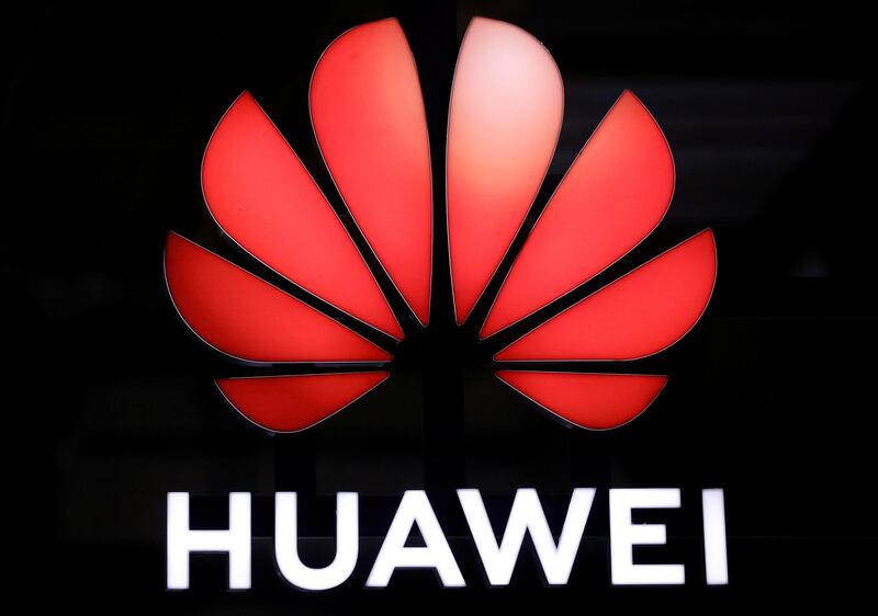 FILE PHOTO: A Huawei signage is pictured at their booth at Interpol World in Singapore July 2, 2019.  REUTERS/Edgar Su/File Photo