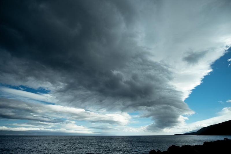 Heavy clouds are seen above the sea, in Sao Roque do Pico, on the Pico Island, as Hurricane Lorenzo passes over the Portuguese archipelago of the Azores.
 AFP