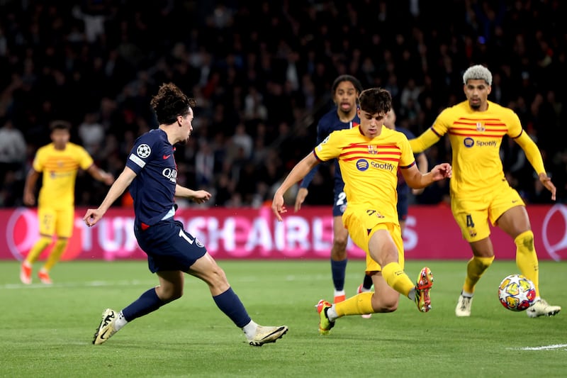 Vitinha shoots to score PSG's second goal to give the hosts a 2-1 lead against Barcelona. Getty Images