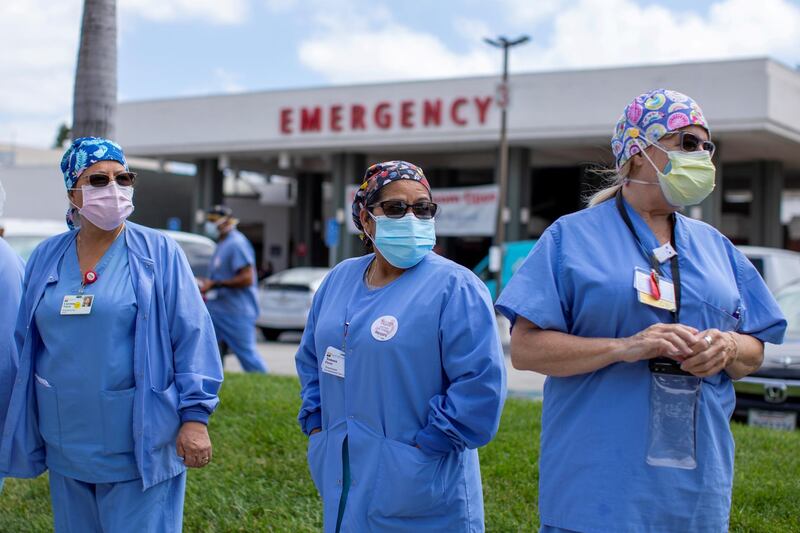 Healthcare workers at Fountain Valley Regional Hospital hold a rally outside their hospital for safer working conditions in Fountain Valley, California. Reuters