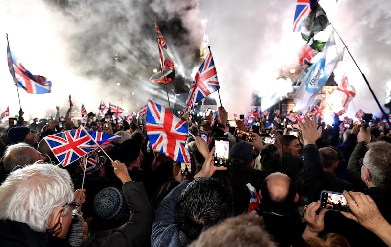 Pro Brexit supporters celebrate at Parliament Square as the United Kingdom exits the EU on January 31, 2020