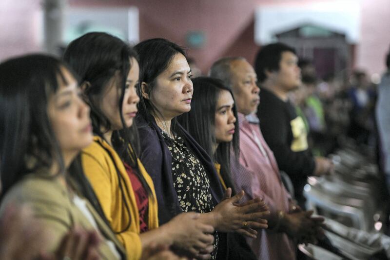 Abu Dhabi, United Arab Emirates - Devotees during mass at St. JosephÕs Cathedral in Mushrif. Khushnum Bhandari for The National