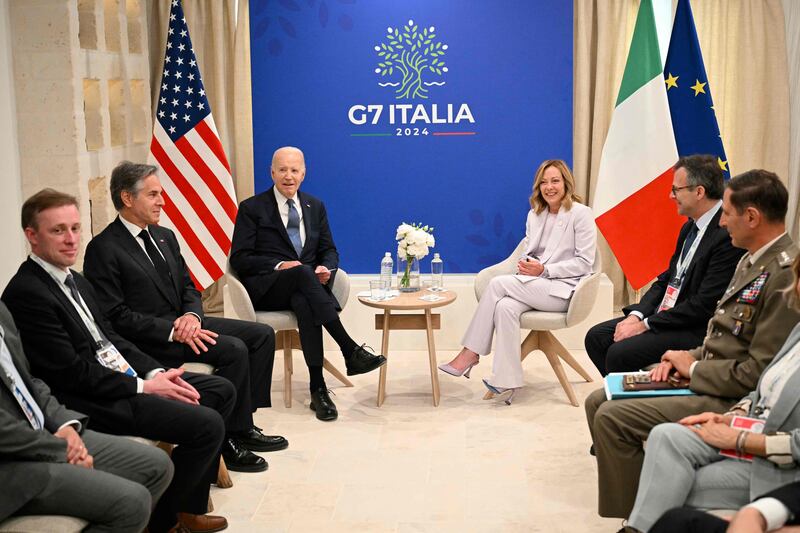 US President Joe Biden and Italy’s Prime Minister Giorgia Meloni meet on the sidelines of the G7 Summit, in Savelletri. AFP
