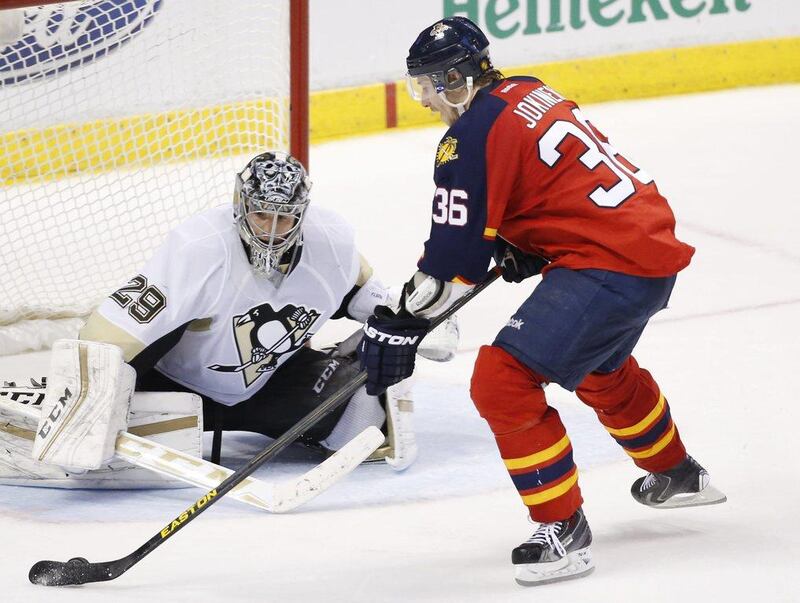 Florida Panthers player Jussi Jokinen shoots the winning shot during a shootout against the Pittsburgh Penguins on Monday. Wilfredo Lee / AP / February 15, 2016 