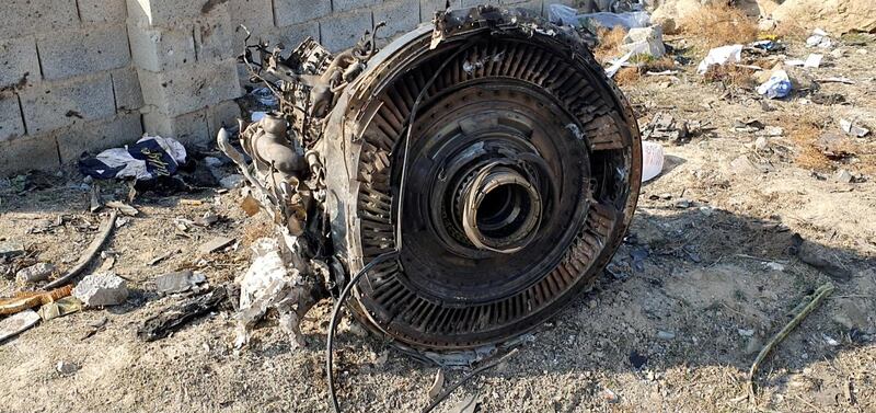 FILE PHOTO: General view of the debris of the Ukraine International Airlines, flight PS752, Boeing 737-800 plane that crashed after take-off from Iran's Imam Khomeini airport, on the outskirts of Tehran, Iran January 8, 2020 is seen in this screen grab obtained from a social media video via REUTERS THIS IMAGE HAS BEEN SUPPLIED BY A THIRD PARTY. MANDATORY CREDIT./File Photo