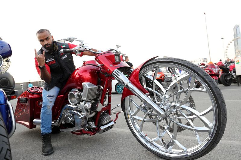 Dubai, United Arab Emirates - November 16, 2018: Mohammed Al Hammadi with his Harley Bagger style at the annual Gulf Car Festival. Friday the 16th of November 2018 at Festival City Mall, Dubai. Chris Whiteoak / The National