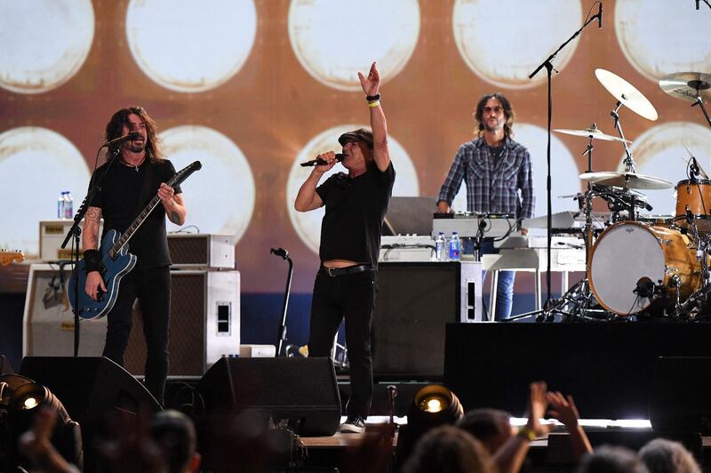 Brian Johnson from AC/DC performs with US rock band the Foo Fighters. AFP