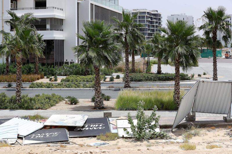 DUBAI, UNITED ARAB EMIRATES , May 25– 2020 :- Barriers around Damac Hills damaged because of last night storm in Dubai.  (Pawan Singh / The National) For News/Online. Story by Nick Webster