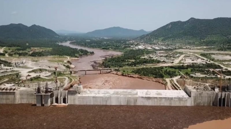 This frame grab from a video obtained from the Ethiopian Public Broadcaster (EBC) on July 20 and July 21, 2020 and released on July 24, 2020 shows an aerial view of water levels at the Grand Ethiopian Renaissance Dam in Guba, Ethiopia, as Prime Minister Abiy Ahmed hails the "historic" early filling of the reservoir on the Blue Nile River that has stoked tensions with downstream neighbours Egypt and Sudan. RESTRICTED TO EDITORIAL USE - MANDATORY CREDIT "AFP PHOTO /Ethiopian Public Broadcaster (EBC) " - NO MARKETING - NO ADVERTISING CAMPAIGNS - DISTRIBUTED AS A SERVICE TO CLIENTS
 / AFP / Ethiopian Public Broadcaster (EBC) / - / RESTRICTED TO EDITORIAL USE - MANDATORY CREDIT "AFP PHOTO /Ethiopian Public Broadcaster (EBC) " - NO MARKETING - NO ADVERTISING CAMPAIGNS - DISTRIBUTED AS A SERVICE TO CLIENTS

