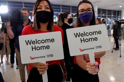 Qantas staff welcome back travellers arriving on the first quarantine-free international flights at Sydney International Airport in November 2021. EPA