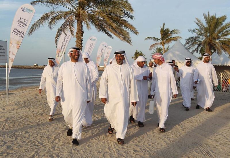 Visitors attend the Al Gharbia Watersports Festival.