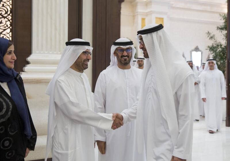 Sheikh Mohammed bin Zayed with Dr Ali Rashid Al Nuaimi, Director General of Adec and Abu Dhabi Executive Council Member, second left, Hussain Ibrahim Al Hammadi, Minister of Education, third left, and Jameela Al Muhairi, Minister of State for Public Education Affairs, left, at Al Bateen Palace. Mohamed Al Hammadi / Crown Prince Court - Abu Dhabi