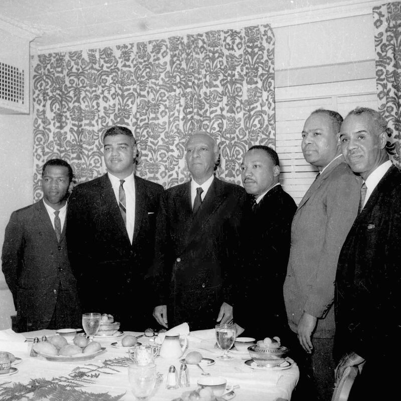 Six leaders of the nation's largest black civil rights organizations pose at the Roosevelt Hotel in New York on July 2, 1963. From left, are: John Lewis, chairman Student Non-Violence Coordinating Committee; Whitney Young, national director, Urban League; A. Philip Randolph, president of the Negro American Labor Council; Martin Luther King Jr., president Southern Christian Leadership Conference; James Farmer, Congress of Racial Equality director; and Roy Wilkins, executive secretary, National Association for the Advancement of Colored People. AP Photo