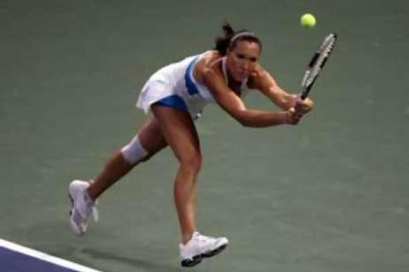 Jelena Jankovic returns to Vania King of the US during the third day of the East West Bank Classic.