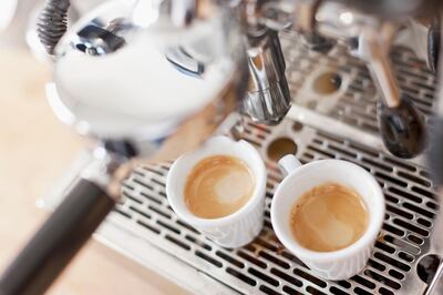 Espresso machine pouring cups of coffee (Getty Images) *** Local Caption ***  AL06NO-ITALY-ESPRESSO.jpg