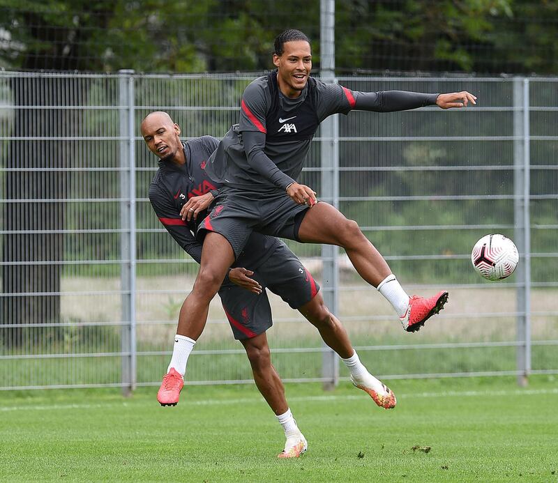 SALZBURG, AUSTRIA - AUGUST 16: (THE SUN OUT. THE SUN ON SUNDAY OUT) Virgil van Dijk of Liverpool with Fabinho of Liverpool during a training session on August 16, 2020 in Salzburg, Austria. (Photo by John Powell/Liverpool FC via Getty Images)