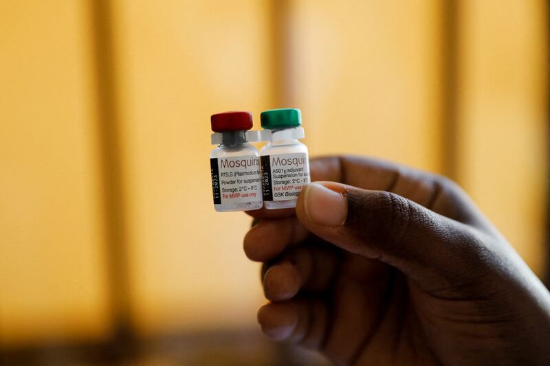 A nurse holds malaria vaccine vials at the Lumumba Sub-County Hospital in Kisumu, Kenya.  Reuters