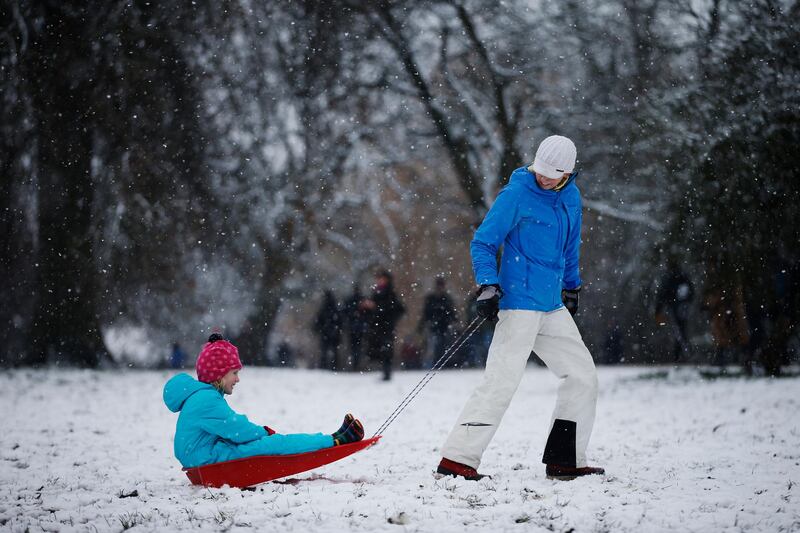 People go sledging in the snow on Parliament Hill on Hampstead Heath in London, United Kingdom. Parts of the country saw snow and icy conditions as arctic air caused temperatures to drop. Getty Images