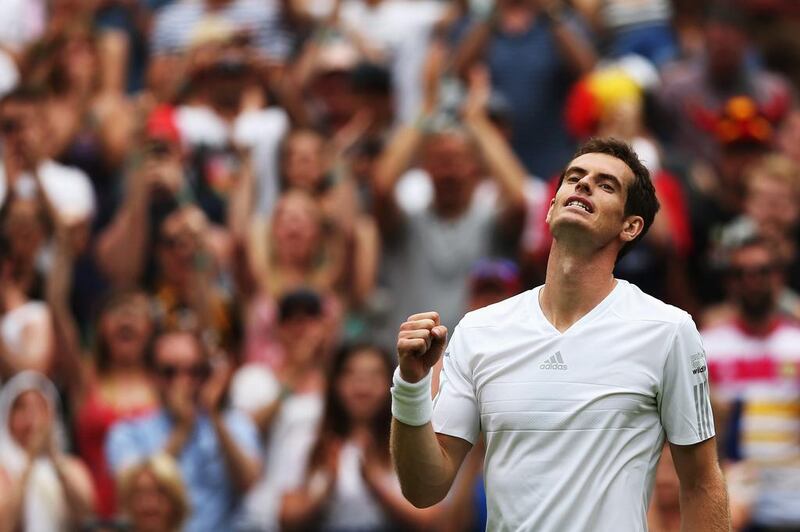 Andy Murray walked on to the Centre Court at Wimbledon for the first time since his title win last year and walked out with an easy opening-round victory over David Goffin of Belgium. Matthew Stockman / Getty Images