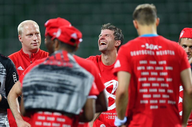 Thomas Muller celebrates securing the Bundesliga title. Getty