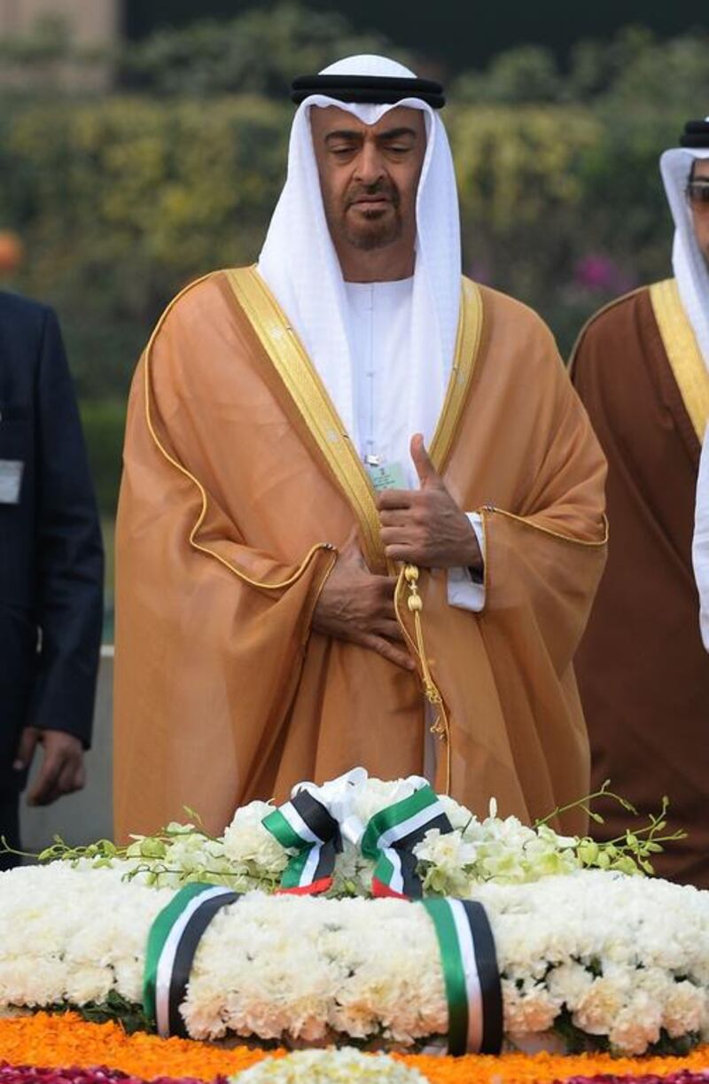 Sheikh Mohammed bin Zayed, Crown Prince of Abu Dhabi and Deputy Supreme Commander of the Armed Forces,  pays a tribute at Rajghat, the memorial for Mahatma Gandhi in New Delhi on Wednesday. Prakash Singh / AFP