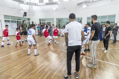 DUBAI, UNITED ARAB EMIRATES. 25 FEBRUARY 2019.  Arsenal FC and UAE Al Nasr FC players visit the Rashid Center for People with Determination in Al Barsha. (Photo: Antonie Robertson/The National) Journalist: Liza Ayach Section: National.