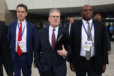 Shadow foreign secretary David Lammy, right, with Labour party leader Keir Starmer and shadow energy secretary Ed Miliband at Cop28 in Dubai. Bloomberg