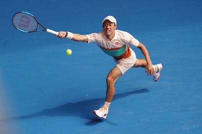 epa07291518 Kei Nishikori of Japan in action against Ivo Karlovic of Croatia during their second round match on day four of the Australian Open tennis tournament in Melbourne, Australia, 17 January 2019.  EPA/MARK DADSWELL  AUSTRALIA AND NEW ZEALAND OUT