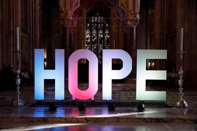 A sign reading ' HOPE' is seen inside Peterborough Cathedral. Reuters