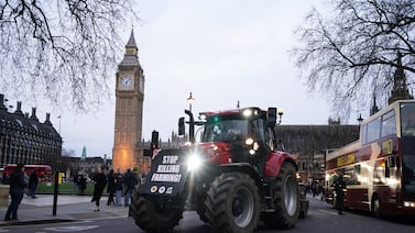 Farmers take part in a tractor "go-slow" through Parliament Square, Westminster, to raise awareness of the difficulties for the British farming industry which are putting food security at risk. Monday March 25, 2024. PA