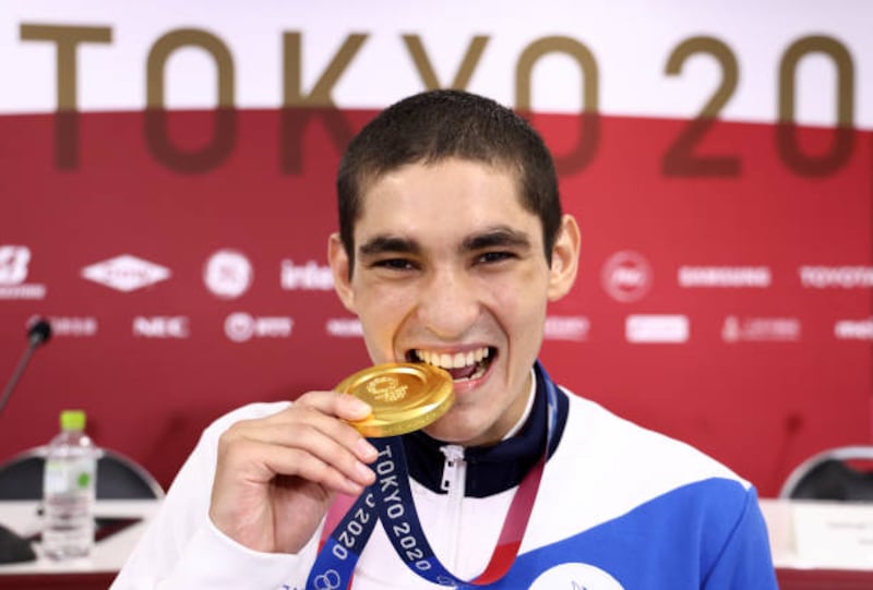 Gold medalist Albert Batyrgaziev of the Russian Olympic Committee at an award ceremony for the men's featherweight (52-57kg) boxing at the 2020 Summer Olympic Games.