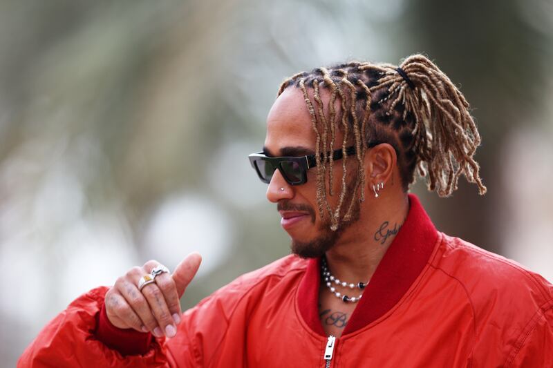 Lewis Hamilton walks in the Paddock at Bahrain International Circuit. Getty