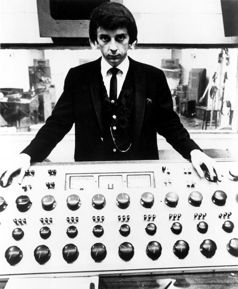LOS ANGELES - 1966: Producer Phil Spector poses at the mixing board during a recording session at Gold Star Studios in 1966 in Los Angeles, California. (Photo by Michael Ochs Archives/Getty Images) 