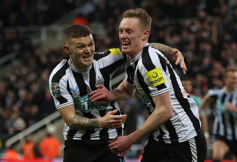 Sean Longstaff celebrates with Kieran Trippier after scoring the first goal. Action Images