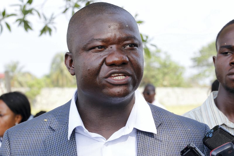 epa05053588 Tolbert Nyenswah, Chair of 'Incident management Systems' (IMS) and  Deputy Minister Disease Surveillance and Epidemic Control at the Ministry of Health, makes remarks during the official discharging ceremony of two ebola survivors from the ELWA Ebola Treatment Unit in Monrovia, Liberia, 03 December 2015. Three new cases of Ebola have been confirmed in Liberia less than three months after the country was declared free of the virus, the World Health Organization (WHO) has said.  EPA/AHMED JALLANZO *** Local Caption *** 52434070