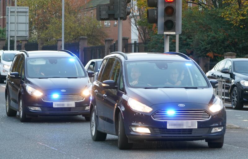 Police cars outside the hospital. PA.