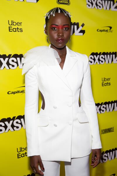 Actress Lupita Nyong’O attends the "US" movie premiere during the 2019 SXSW Conference and Festivals at the Paramount Theatre on March 8, 2019 in Austin, Texas. / AFP / SUZANNE CORDEIRO
