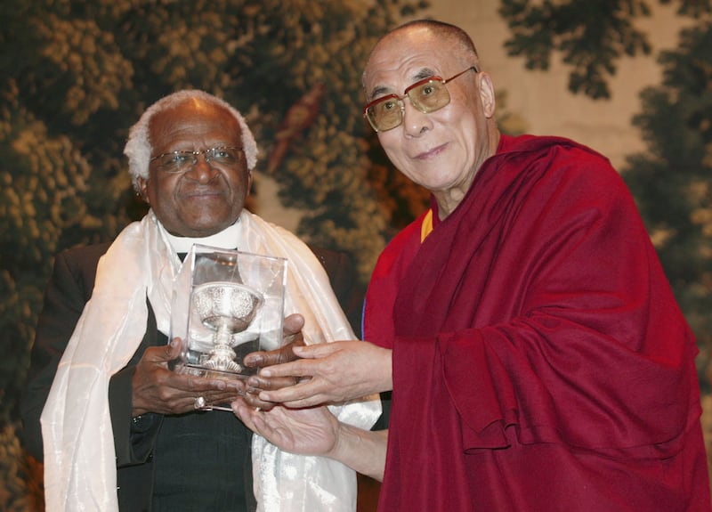 The Dalai Lama and Archbishop Desmond Tutu in 2006 in Brussels, Belgium. Getty