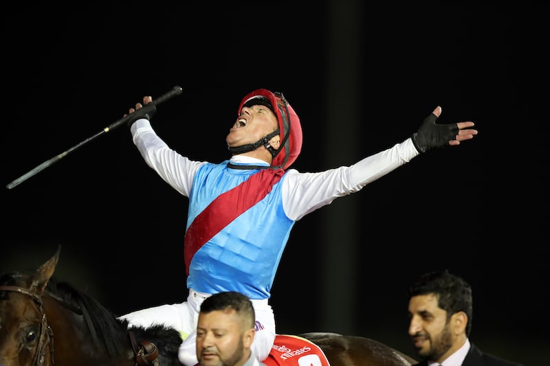 Country Grammer, ridden by Frankie Dettori wins the Dubai World Cup at Meydan Racecourse in Dubai. Chris Whiteoak / The National