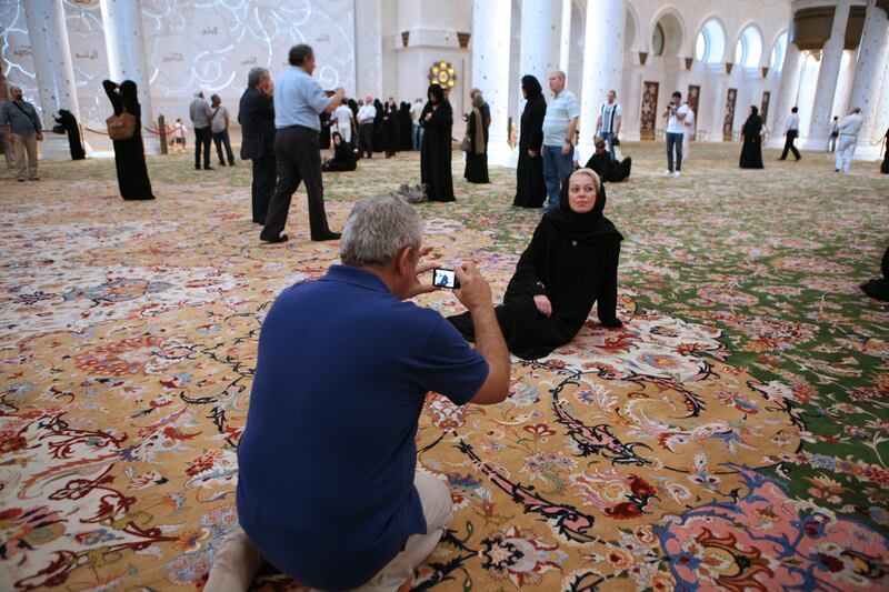 5-Dec-2011, Sheikh Zayed Mosque, Abu Dhabi. 
Non-Muslims like tourists are visiting Sheikh Zayed Mosque from 9 AM - 12 PM every day except for Friday and Public Holidays with a free guided tour. Fatima Al Marzouqi/ The National

