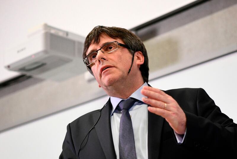 Former Catalan leader Carles Puigdemont speaks during a debate at the University of Copenhagen on January 22, 2018.
Former Catalan leader Carles Puigdemont arrived in Copenhagen, defying a threat by Madrid to issue a warrant for his arrest if he leaves Belgium, where he has been in exile since a failed independence bid. The debate is titled: "Catalonia and Europe at a crossroads for democracy?" / AFP PHOTO / Jonathan NACKSTRAND
