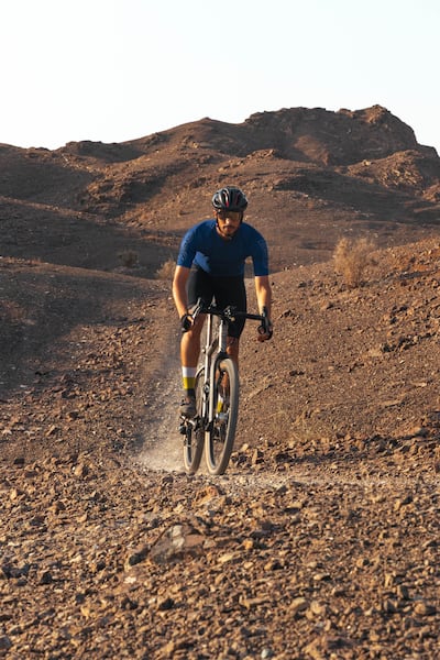 Edge Cycling founder Omar Al Saadi rides his gravel bike in Shawka. Photo: Edge Cycling