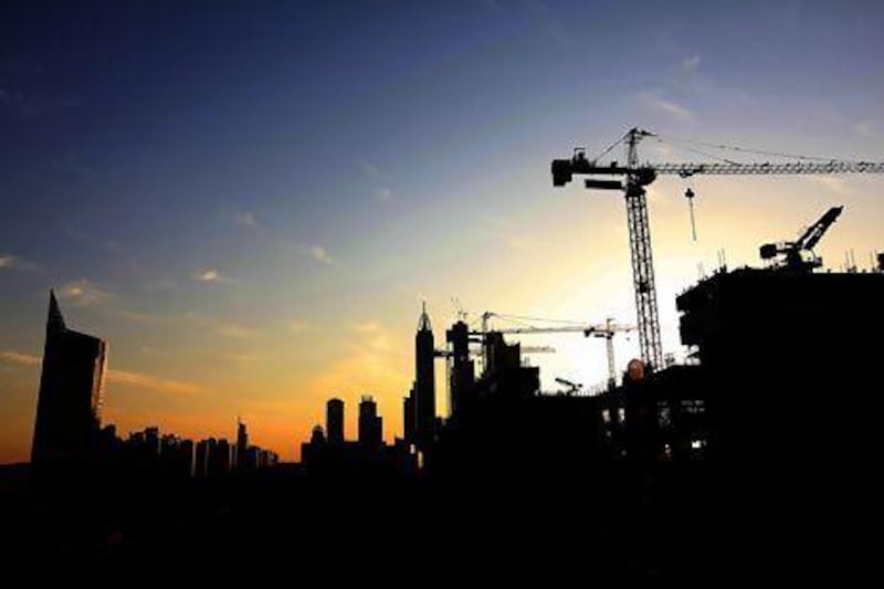 Dubai, United Arab Emirates-November 15, 2012; Cranes at a construction site in Dubai . ( Satish Kumar / The National ) For Business
