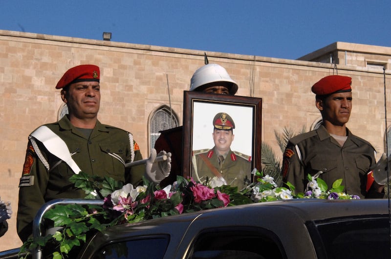 December 22, 2013: Funeral proceedings for a major general of the Iraqi army’s 7th division in Anbar. The division's leadership were killed when a house they are raiding explodes after being rigged with bombs. The mixed Sunni-Shiite group is seen as one of the last non-sectarian units in the Iraqi army. Reuters