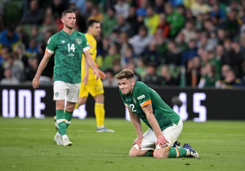 Ireland's Nathan Collins sinks to his knees after the Nations League defeat to Ukraine. Getty