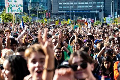 Thousands of protesters march on the streets during the global climate strike in Montreal, Canada on September 27, 2019. 
 Teen activist Greta Thunberg called on Canadian Prime Minister Justin Trudeau and other world leaders Friday to do more for the environment, as she prepared to lead a march in Montreal that was part of a wave of global "climate strikes." / AFP / Martin OUELLET-DIOTTE
