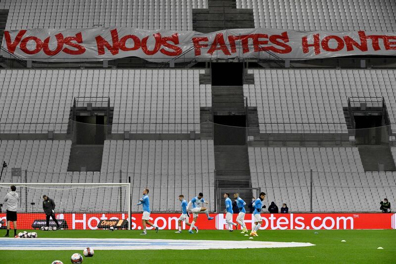 A banner set-up by Marseille supporters reading "you make us ashamed" prior to match against Lens. AFP