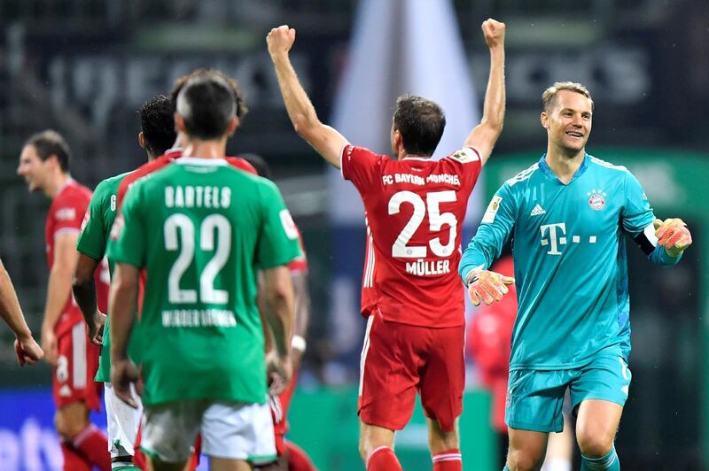 Manuel Neuer and Thomas Muller celebrate. Reuters